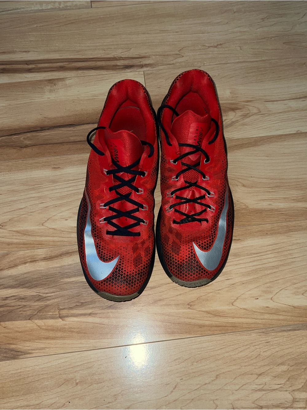 Nike Red and Black Athletic Shoes with Silver Swoosh